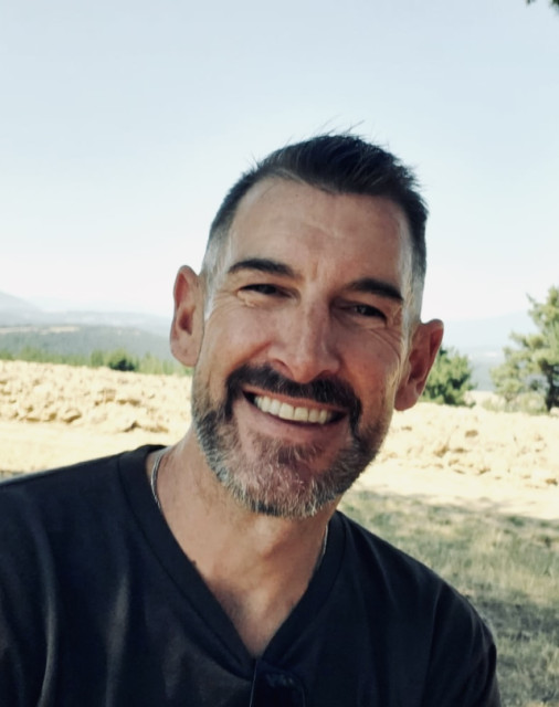 Dan E.